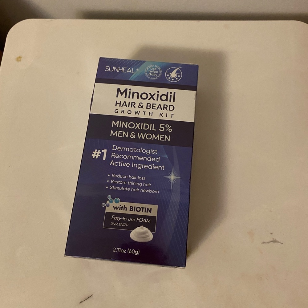 Minoxidil hair growth cream